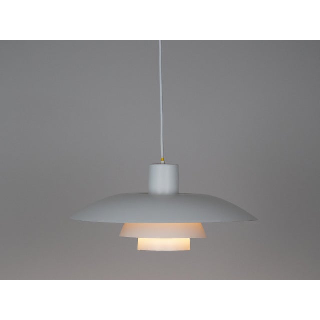 The ph 4/3 lamp is an absolute classic, designed by the renowned danish designer and architect poul henningsen. It has...