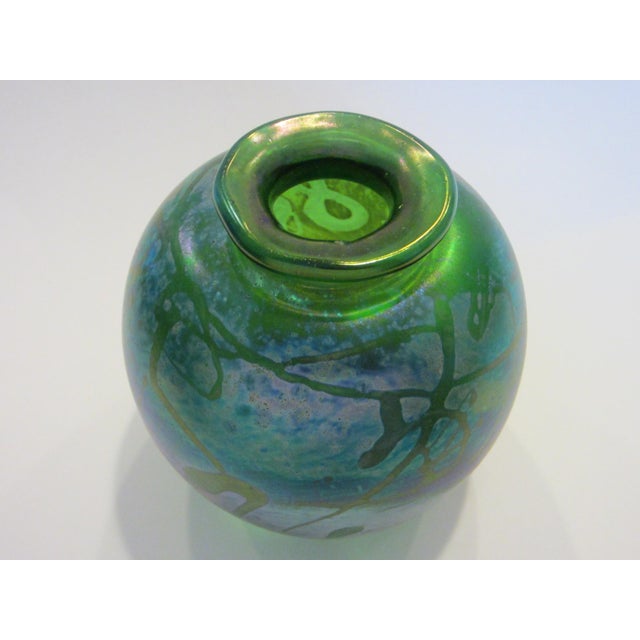 Incredible example of American Glass Art , an iridescent, gorgeous, hand blown modern vessel created, signed in etch, by...