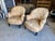 A stunning, authentic pair of antique French fauteuils crapaud (historically known as "crapaud" or "toad" chairs)....