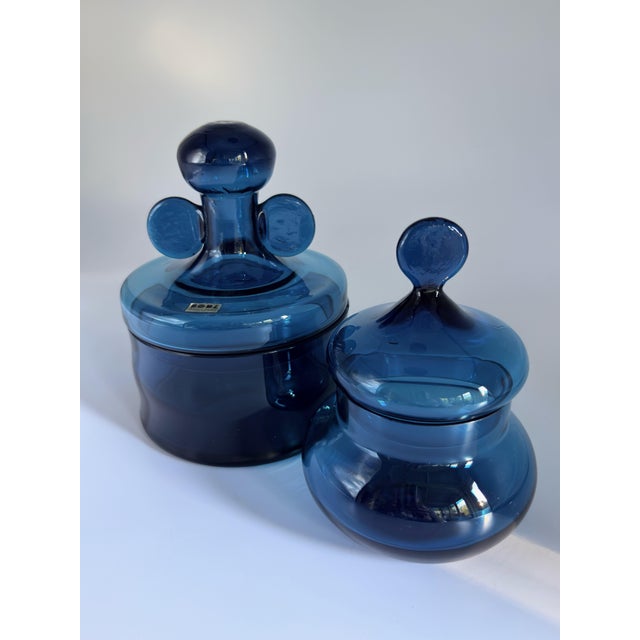 Beautiful pair of iconic petroleum blue glass lidded jars/bonbonnieres from the "Basun" series (also known as the Blue...