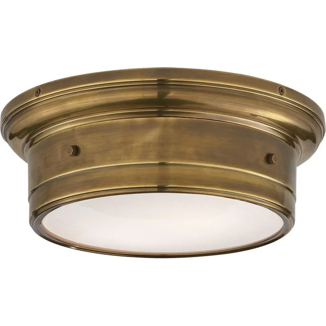 Siena Small Flush Mount in Hand-Rubbed Antique Brass with White Glass Designer: Mounting: Flush Shade Detail: White Glass...