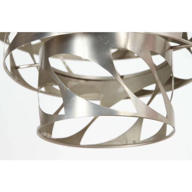 Brushed aluminum fixture from the 1980s.