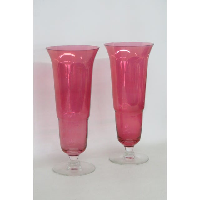 This gorgeous Pair of Vases is made of glass. This highly collectible pair presents a lovely vintage design with a clear...