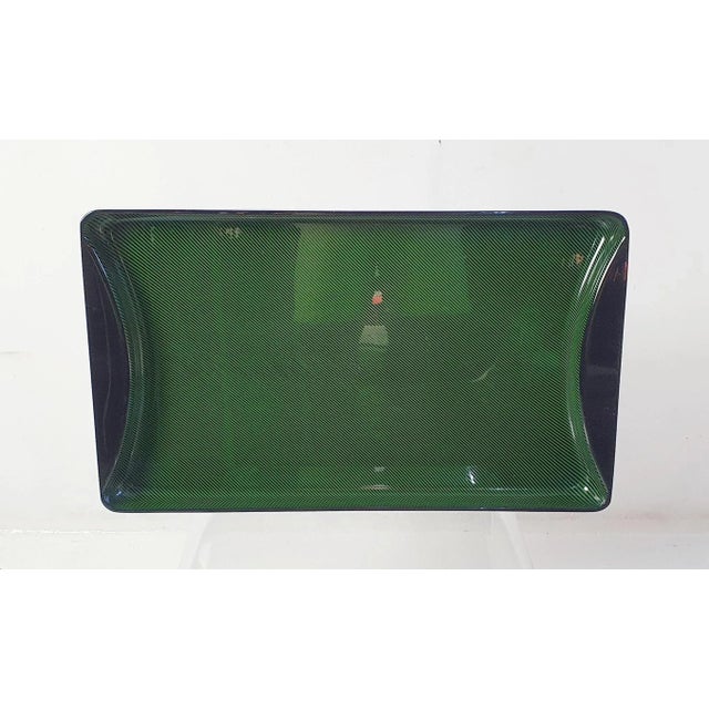 A large rectangular vintage serving tray by Guzzini Italy in lucite. The base is jet black with diagonal stripes in green....