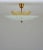 Beautiful flush mount in brass and frosted glass, produced by Orrefors in Sweden circa 1950. The lamp consists of an...