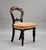 A charming set of four Victorian mahogany dining chairs, dating to the mid–late 19th century, offering elegant shaping and...