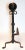 Antique early 20th century cast and wrought iron andirons. Scroll and ball finials with collared shafts. Circa 1900.