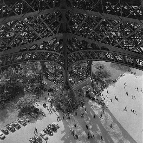 Eiffel Tower Leg Tourists queue up to climb the Eiffel Tower in Paris, circa 1950. (Photo by Three Lions/Hulton...
