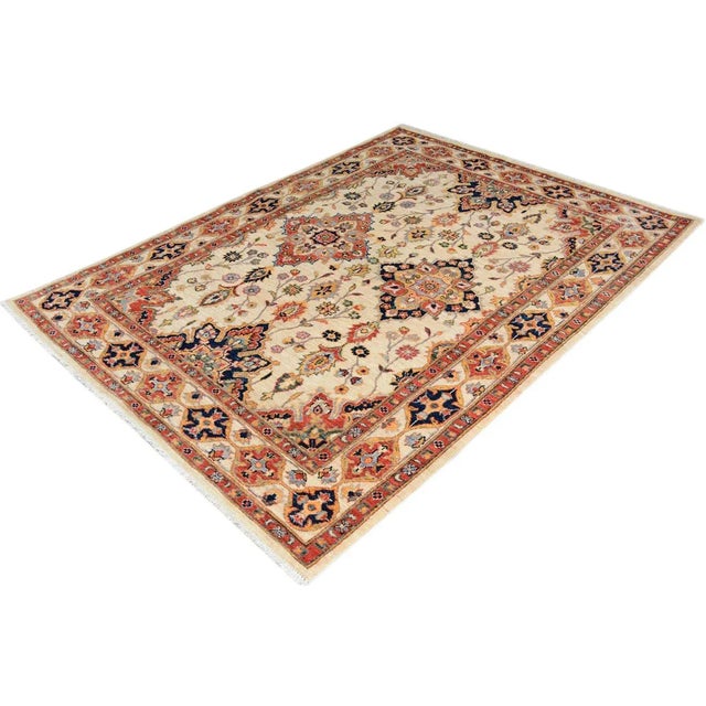 This gorgeous transitional handmade rug follows an abstract pattern which exotically repeat like a continuous reflection....