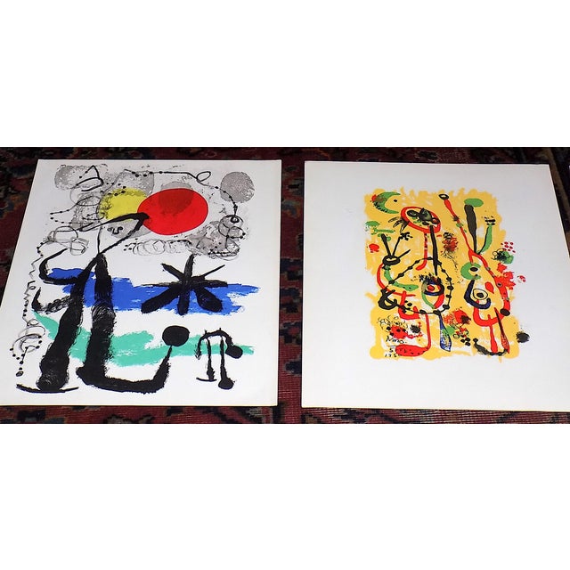 This mid 20th century set of nine (9) [incl. one double image] vintage color mid 20th century lithographs by Joan Miro...