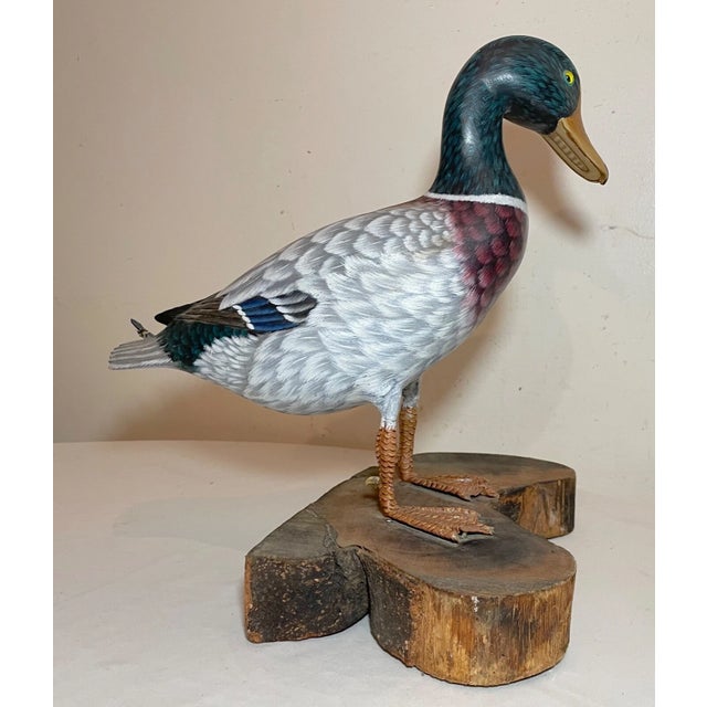 Up for sale is a very nice quality vintage hand carved wooden mallard Folk Art duck sculpture. It's completely carved by...