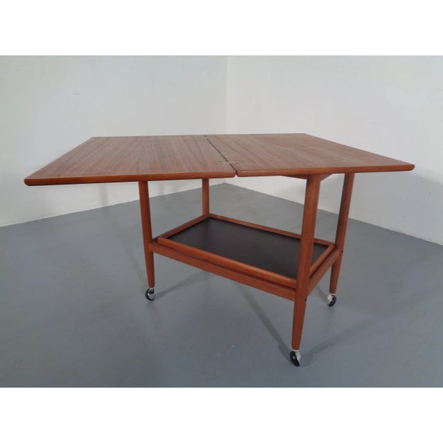 Danish teak serving cart by Grete Jalk in very good condition. Height 62 cm. Width 70-88 cm. Depth 44-70 cm. I have...