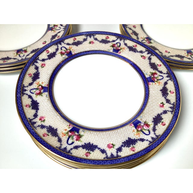 A set of twelve dinner plates by Royal Doulton, a renowned English ceramic mfg. For Sale - Image 9 of 9