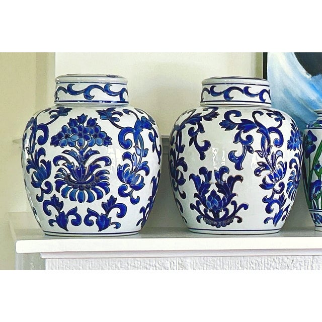 Vintage Chinoiserie Blue & White Chinese Porcelain Urns - A Pair For Sale - Image 11 of 12
