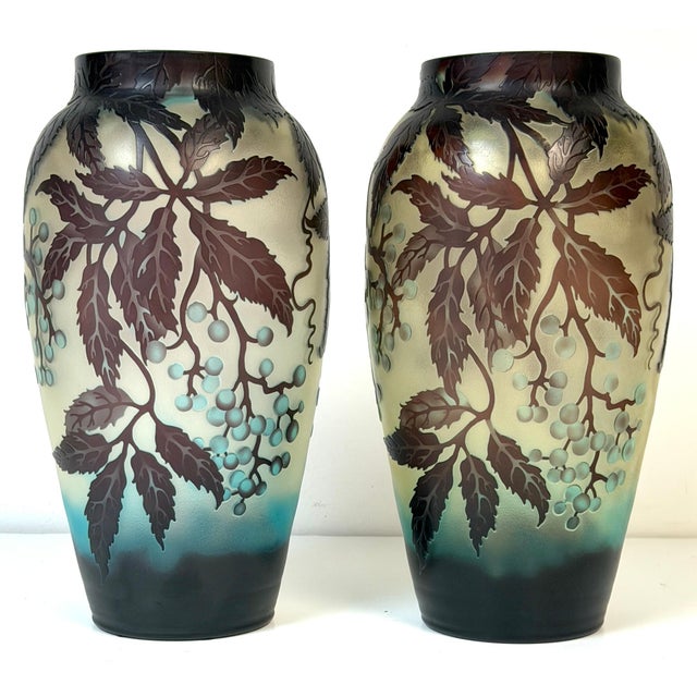 Pair of Stunning French Cameo Glass Vases in the Style of Gallé This stunning pair of French cameo glass vases, executed...