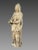 Alabaster sculpture of Saint Anne, 16th century. Depicts Saint Anne crowned, holding a book upon which rests a crown...