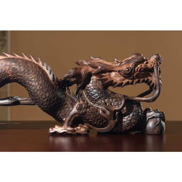 Vietnamese Nha Trang White Kyara Agarwood — “Dragon Across the World” Water-Sinking Grade Sculpture With its luminous,...