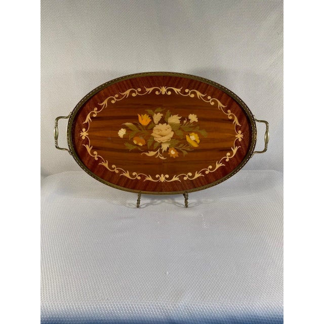 A fabulous large Oval Italian Marquetry Gallery Serving Tray with gorgeous inlays of various colored woods. Circa...