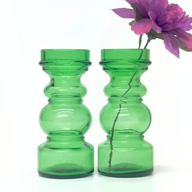 Green transparent candle holders, set of 2. A curvaceous pair of green glass candlestick holders, perfect for livening up...