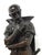 An 18th century bronze statue of a Shakespearean character in period dress with pensive look. Signed Pierre Marie Francis...