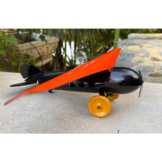 ANTIQUE WYANDOTTE TOY PLANE DETROIT LOCKHEED VEGA PRESSED STEEL AIRPLANE The toy Plane official name is: Wyandotte High...