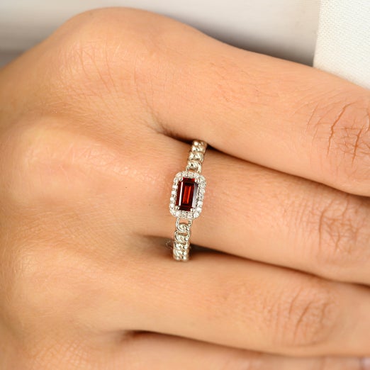 Baguette Garnet with Halo Diamonds Engagement Ring in 14k Solid White Gold featuring natural garnet of 0.32 carats and...