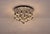 Chrome-plated steel ceiling light with 19 lights arranged in a circular cluster. 1970s edition, in the style of Gaetano...