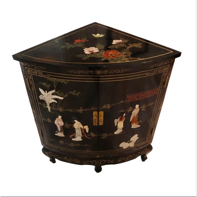 Elegant Chinese corner cabinet featuring painted scenes of courtly ladies with stunningly inlaid stone and painted gold...