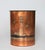 Vintage oval metal waste basket wrapped in an embossed copper sheet featuring a nautical lighthouse and seabirds scene....