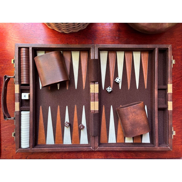 Vintage classic Backgammon game in brown case with tan stripes. One of the world's oldest and most beloved games. Complete...