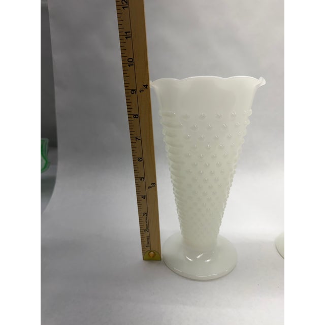 Charming set of two mid-century vintage Fenton hobnail milk glass vases, perfect for adding a touch of classic Americana...