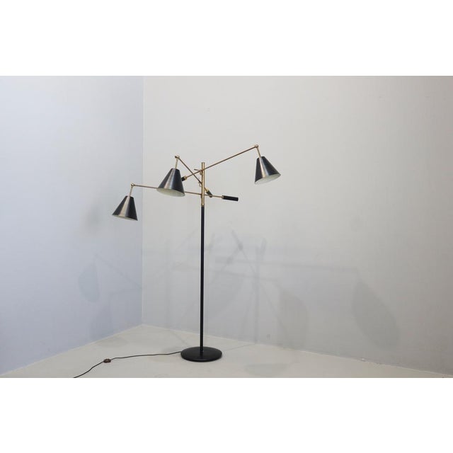 Angelo Lelli for Arredoluce, Triennale floor lamp, brass no. l, Italy, circa 1953. This iconic lamp was designed by...