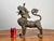 This striking vintage cast brass Pixiu figure has a wonderfully dramatic presence, combining the powerful symbolism of the...