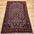 "An exceptional mid-20th century Persian Malayer rug hand-knotted with an elegant allover Herati geometric pattern on a...