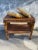 This is a timeless beauty . Can fill the capacity of a mini bar . Small coffee table , delay stand , a pool side towel...