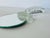 1980s Riker Art Glass Hand Mirror made in Providence RI. Clear and frosted glass hold the small round mirror. Signed on...