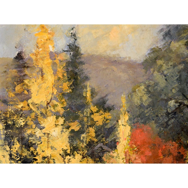 Lush landscape of an autumn forest by Evelyn Campbell (Australian, 20th Century). A path runs from the lower right of the...
