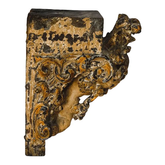 Wood carved and painted Putti from Portugal. Wood is intricately carved and the putti has a sweet smiling face that shows...