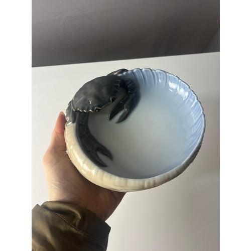 A bowl by Royal Copenhagen – an exceptional porcelain piece designed with meticulous attention to detail by the talented...