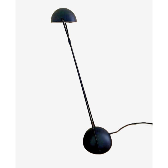A 1980's Italian desk lamp by Paolo Piva Stefano Cevoli for Meridiana Vermezzo. The postmodern style lamp has a spherical...