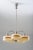 Distinctive 1930s chandelier designed by harald notini for arvid böhlmarks lampfabrik. The nickel-plated fixture features...