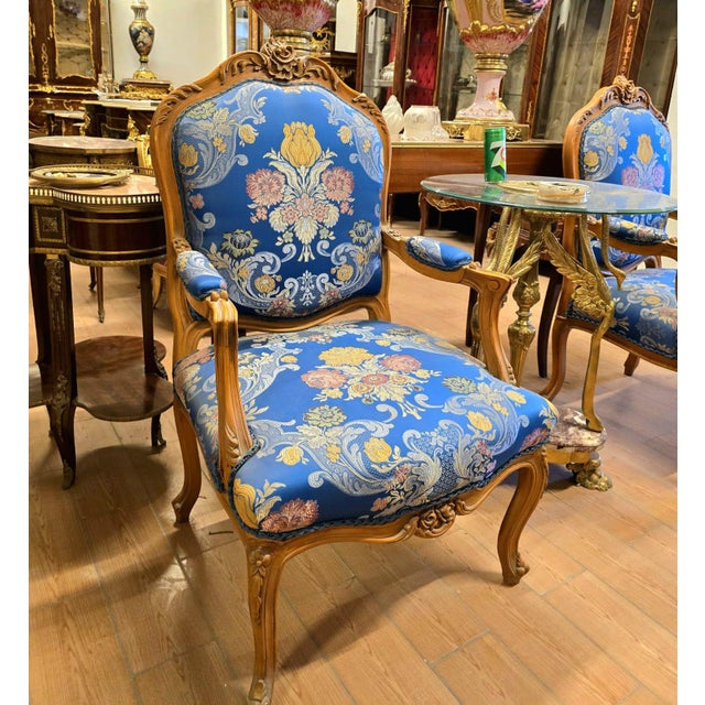 Bring timeless French elegance to your interior with this beautifully crafted Louis XV-style armchair, featuring an...