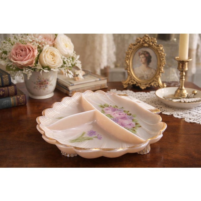 Elegant and finely crafted, this vintage Cambridge Glass Company three-section relish dish showcases the refined artistry...