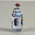 This intriguing cylindrical chinese porcelain snuff bottle, dating back to the 20th century, is a collector's item that...