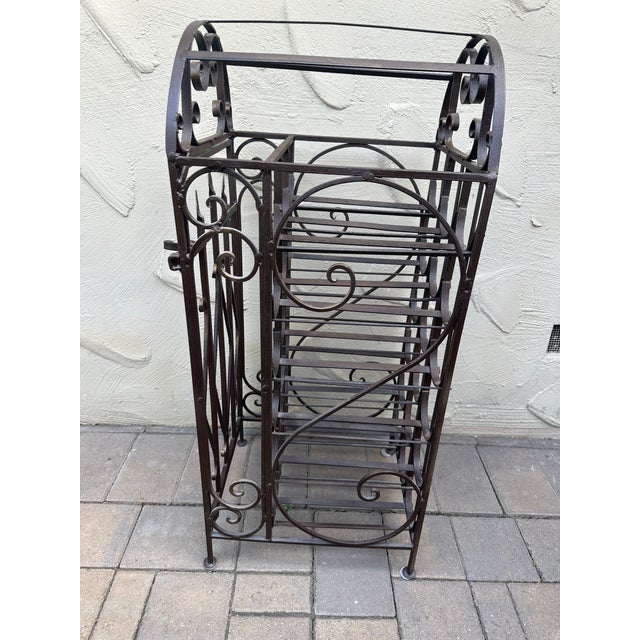 Spanish Revival vintage Wrought Iron"Cage Shape"Wine Rack with 18 bottles of capacity. It has beautiful design typical...