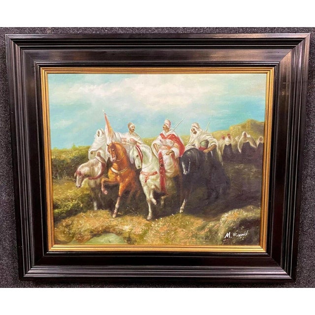 Orientalist School: Martine Rivart (1956) Oil on canvas painting, "The Desert Riders." Beautifully framed in black...
