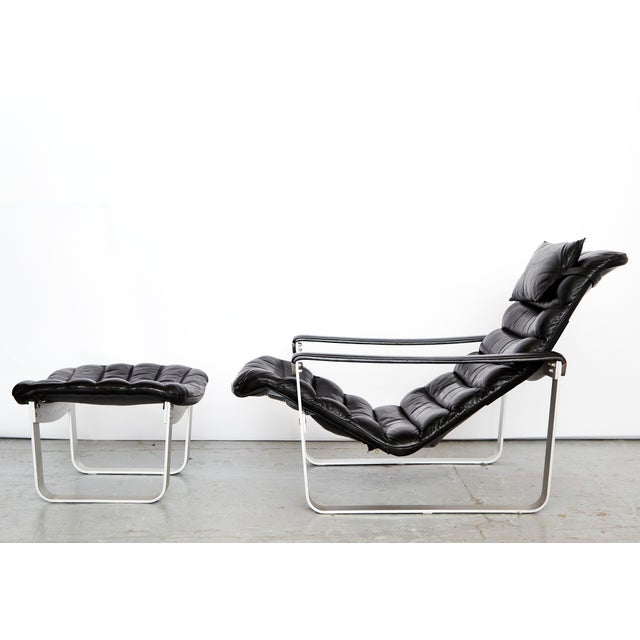 Manufacturer: ASKO Design: Ilmari Lappalainen (1918-2006) Model: Pulkka Condition: Very good condition. The leather shows...