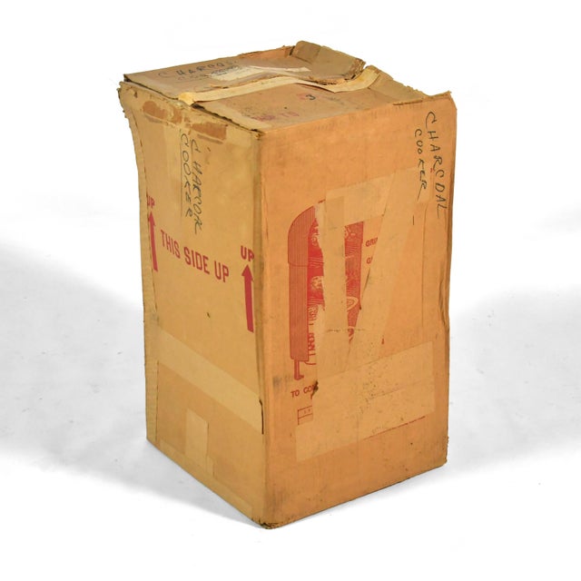 This stunning, rare example of an early "Esquire" model #271 Mr. Meat Smoker is complete, unused, and in its original box....