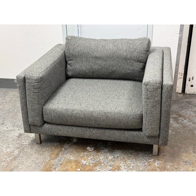 esign Plus Gallery presents a Cade Armchair by Room & Board. This contemporary armchair is upholstered in textured gray...