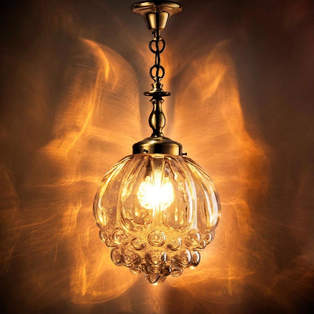 This exclusive pendant light was manufactured in the 1960s by the renowned glass manufacturer limburg in germany. The...